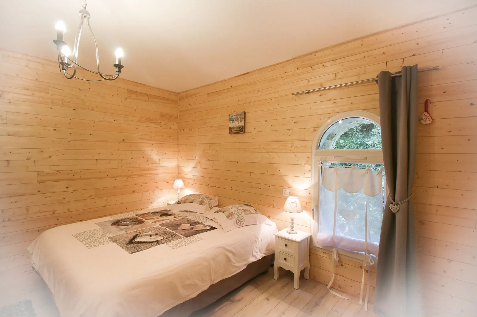 First timber bedroom with a 160 by 200 centimetre double bed